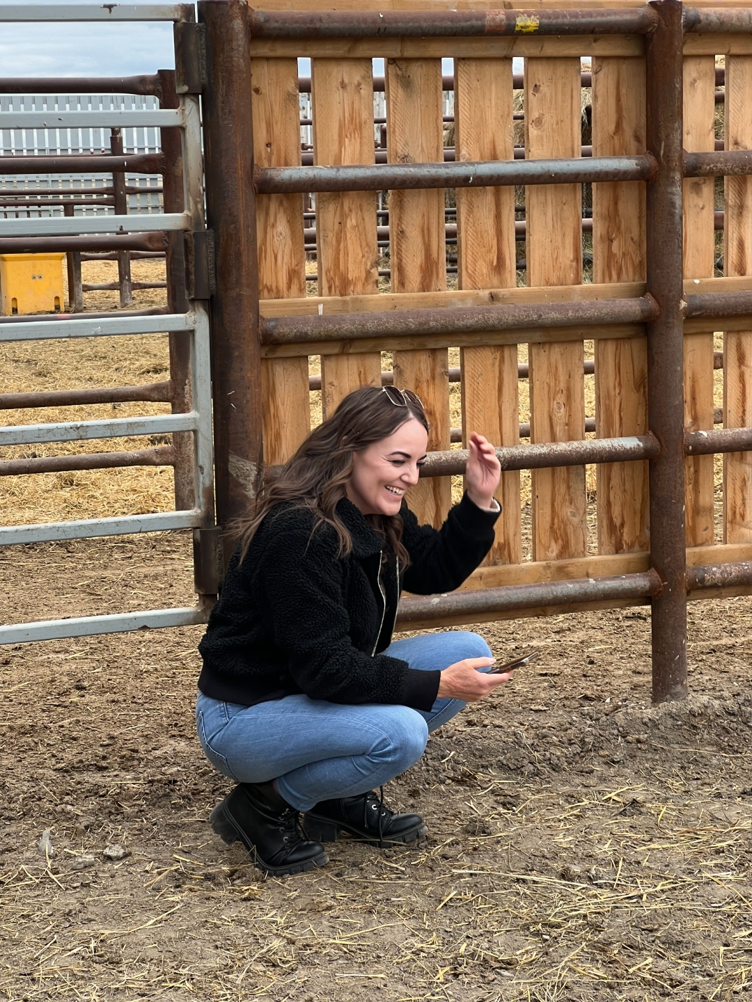 Ashley Drummond at a corral, capturing content for AG Social clients